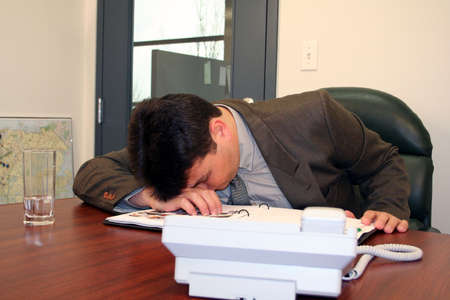 man sleeping at work