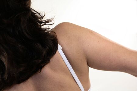 girl back over whiteの写真素材