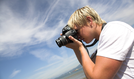 close up photographer over deep blue sky