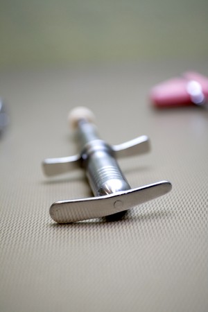 chiropractic tool close up called activator on desk
