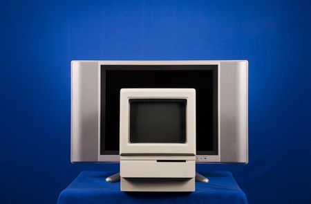 old and new screen on blue backgroundの写真素材