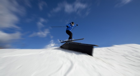 man skiing doing acrobatic figuresの写真素材