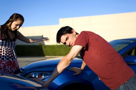 people in a car accident situation at day timeの写真素材