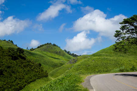 Mountains landscape with a blue sky with many cloudsの写真素材