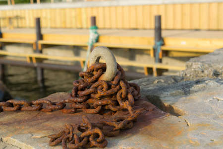 Boat chain at pierの写真素材