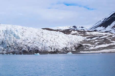 Glacier meeting the ocean at Svalbard in Norwayの写真素材
