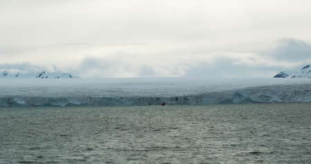Glacier meeting the ocean at Svalbard in Norwayの写真素材