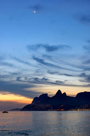 Arpoador, Ipanema and Leblon in Rio de Janeiro after sunset with the hill two brothers and Stone...