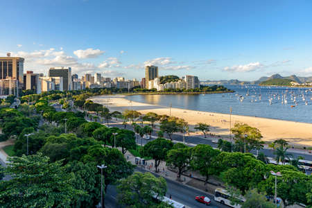 Beach and cove of Botafogo and its buildings cars and boatsの写真素材
