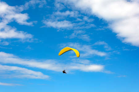Paragliding flight on the hill Lighthouse in Torres city, Rio Grande do Sulの写真素材