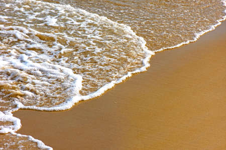 Water over sand in tropical beach