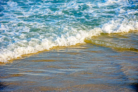 Water over sand in tropical beach