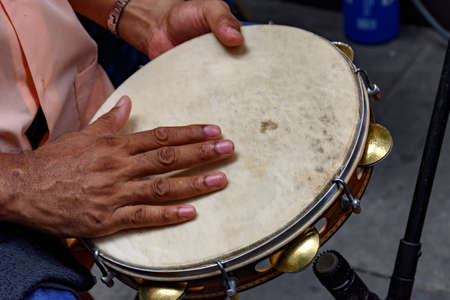 Tambourine being played by a ritimist during a samba performance in Rio de Janeiroの写真素材