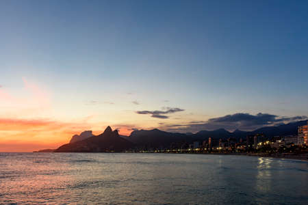 Landscape of the beaches of Arpoador, Ipanema and Leblon in Rio de Janeiro During dusk with its...