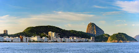 Panoramic image of Copacabana Beach in Rio de Janeiro with its buildings, sea, sand and the Sugar...
