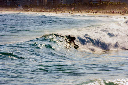 Surfer on Ipanema beach at Rio de Janeiroの写真素材