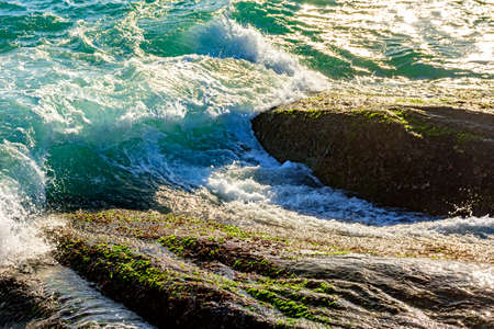 Seawater running through the rocks on Arpoador beach at Ipanema, Rio de Janeiro
