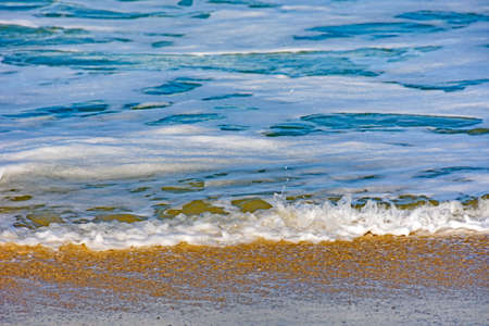 Water over sand in tropical beach