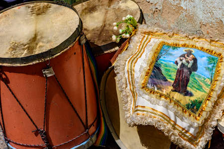 Details of drums in leather, wood and metal with flowers decorating and used during Brazilian...