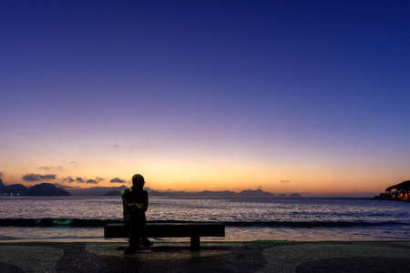 Sunrise on the famous Copacabana beach during the summer of Rio de Janeiro