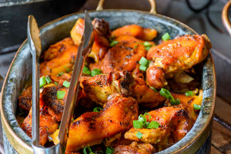 Traditional Brazilian food being prepared in clay pots and in the old and popular wood stoveの写真素材