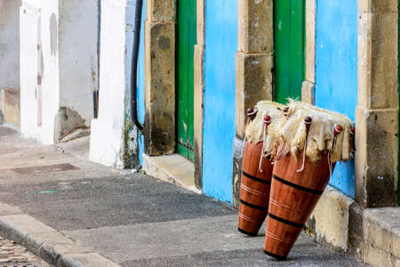 Ethnic drums also called atabaques on the streets of Pelourinho, the historic center of the city of Salvador in Bahiaの写真素材