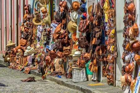 Traditional commerce of typical products, souvenirs and musical instruments of various types on the streets of Pelourinho in the city of Salvador, Bahiaの写真素材
