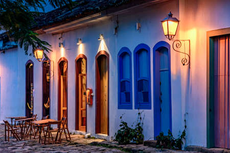 Street and colonial style houses illuminate at night in the city of Paraty on the coast of Rio de Janeiro, Brazilの写真素材