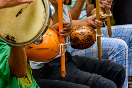 Afro Brazilian percussion musical instruments during a capoeira performance in the streets of Brazilの写真素材