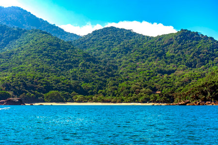 Arrival at Indaiauba beach on the island of Ilhabela seen from the seaの写真素材
