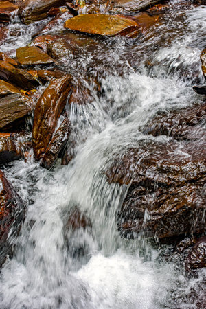 Water from a small stream running over rocks in Minas Geraisの写真素材