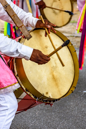 Drummers with colorful musical instruments on the streets of Brazil during a popular festival