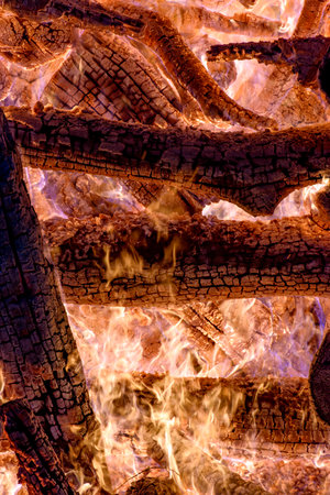 Wood burning in a bonfire in the interior of the state of Minas Gerais during the traditional SÃ£o JoÃ£o festivalの写真素材