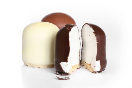 chocolate covered marshmallows with biscuitの写真素材