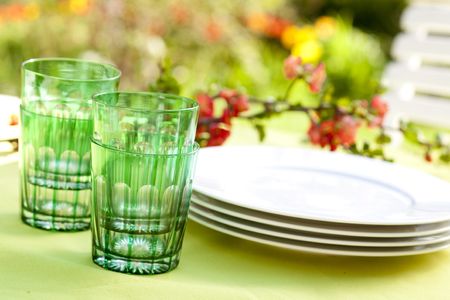 dishes on a garden tableの写真素材