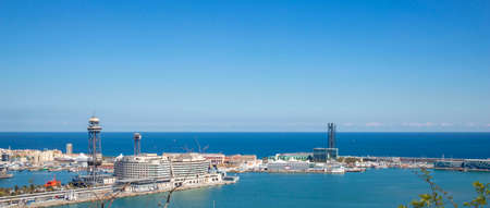 Skyline of Barcelona from Montjuic mountain overlooking the port and the cityのeditorial素材