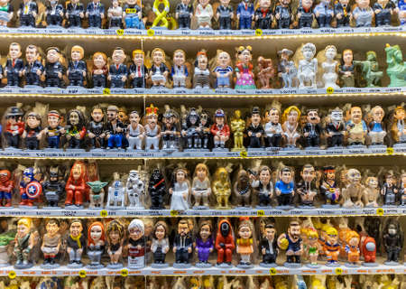 Christmas figurines "El Caganer" typical decoration of Catalan culture, dolls defecatingのeditorial素材