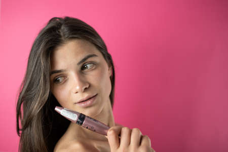 portrait of a woman with lipstick make upの写真素材