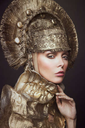 Woman in gold kokoshnik head wearの写真素材