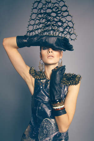 Woman in headwear with spikesの写真素材