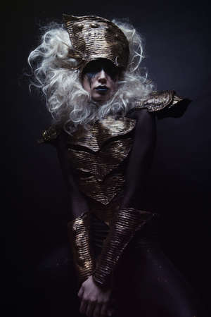 Woman with black make up and white wigの写真素材