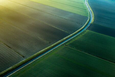 fields viewed by a drone in the sunset