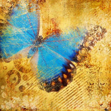 decorative golden background with blue butterflyの写真素材