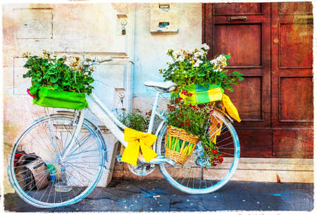 charming streets and old bike with flowers, Italy, artistic retro pictureの写真素材