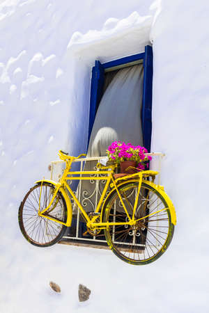 cute street decoration with old bike, Naxos, Greeceの写真素材
