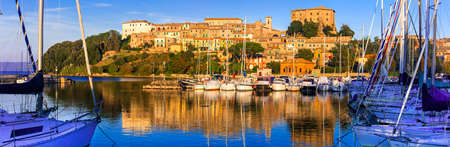 Beautiful Capodimonte village, view with Bolsena lake, Lazio, Italy.の写真素材