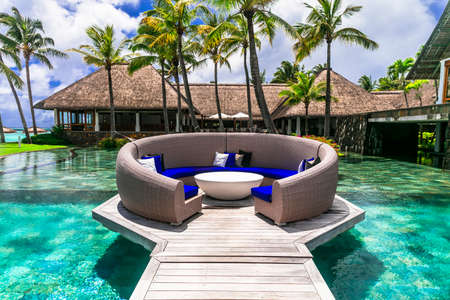 luxury 5 star resort territory with swimming pool and exotic bar - Constance Belle Mare Plage. Mauritius island. Pointe de flacq , Belle Mare. February 2020のeditorial素材