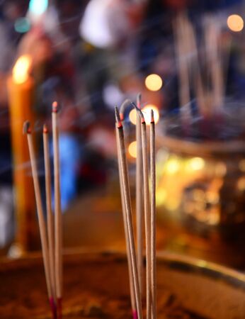 Burning Incense sticks Buddha Statueの写真素材