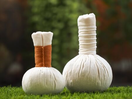 Spa massage compress balls, herbal ball with flower, Thailand, select focusの写真素材