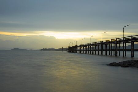 The wood bridge on sunset time in beautiful day, Ranong Thailandの写真素材